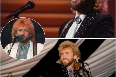 The stage is simple—no flashing lights, no elaborate production—just pure, unfiltered music. Keith Whitley steps forward, guitar in hand, and from the first note, the room falls into a hush. His voice, rich with emotion, carries the weight of heartbreak and longing, each lyric a testament to the kind of storytelling that made country music legendary. As the melody sways like a slow dance beneath the stars, you can feel the soul of a man who lived and breathed every word he sang. Gone too soon, yet never forgotten, Keith set a gold standard that few have ever reached.