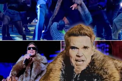 Robbie Williams set the Graham Norton Show on fire with a no-holds-barred, electrifying performance of “Rock DJ”—A New Year’s Eve Thrill Ride!—it was a true rock ‘n’ roll blast! With his iconic style and raw energy, Robbie completely transformed the show, transforming the cozy atmosphere of the show into a rock concert that left everyone breathless. From his simple guitar riffs to his commanding presence, Robbie owned the moment. His electrifying performance of “Rock DJ” was an unforgettable hit, proving once again why he is the ultimate crowd-pleaser.