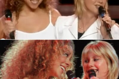 When Mariah Carey and Olivia Newton-John Teamed Up for an Unforgettable Performance of Hopelessly Devoted to You: A Master Class in Vocal Magic! Two Legends, One Iconic Song! Mariah Carey and Olivia Newton-John’s blistering duet on Around the World took Hopelessly Devoted to You to the next level, combining emotion, vocal power, and pure magic. Their undeniable chemistry created an emotional rollercoaster that left fans breathless and wanting more. From Mariah’s soaring vocals to Olivia’s timeless charm, this unforgettable performance reminded us all why these two artists are legends in their own right. Don’t miss the magic!
