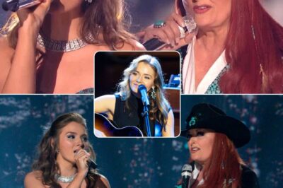 When Wynonna Judd and Emmy Russell took the stage to honor Loretta Lynn, it was more than just a tribute—it was a powerful passing of the torch. Wynonna, with her underrated yet world-class voice, delivered each note with raw emotion, while Emmy, carrying her grandmother’s legacy, proved she is more than just Loretta’s granddaughter—she is an artist in her own right. The depth in Emmy’s voice, combined with her humble authenticity, made this a moment country music will never forget. Watching her bloom into her own sound while still honoring her roots is something truly special, and it’s clear she has a bright future ahead. Whether she won a competition or not, Emmy has already won the hearts of many, and this performance was just the beginning of her incredible journey.