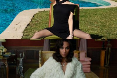 A WICKED SPLITS, ARI! Ariana Grande does the splits in black mini dress and heels as she is featured in W mag alongside 33 other stars