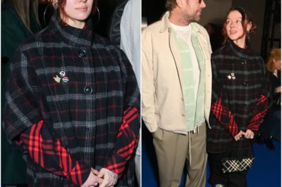 DADDY’S GIRL Nepo-baby attends star-studded Burberry London Fashion Week show with Brit rock icon dad – but can you guess who she is?