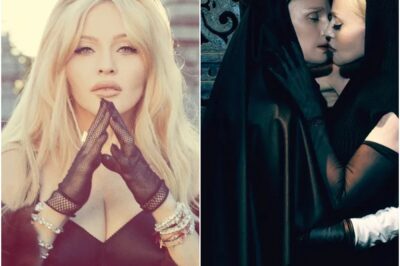 GUNS & ROSARIES Madonna shocks as sexy widow holding ­pistol to her crotch before snogging a nun in raunchy new photoshoot