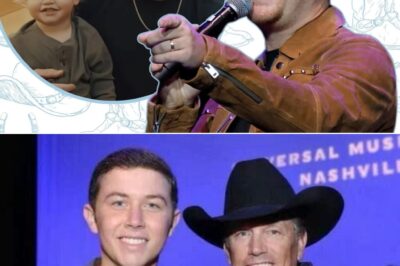 Scotty McCreery’s son, Avery, is already stealing hearts—and the spotlight! In a new viral video, the little one proves he’s got country music in his blood, delivering an adorable rendition of George Strait’s classic “The Chair.” Recorded in a studio, the clip captures their reflections in a pane of glass—McCreery at the mic, holding Avery as the toddler gives it his all. It’s a heartwarming father-son moment that has fans swooning!