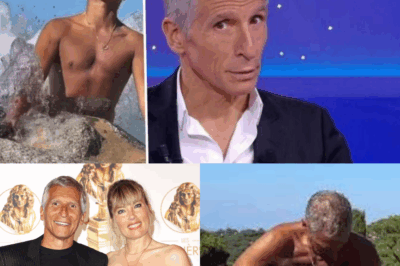 Scène inattendue – Sous le soleil brûlant, Nagui, le célèbre animateur, apparaît torse nu perché sur un rocher isolé, lançant des piques ironiques à Mélanie Page… mais un mouvement furtif de sa main intrigue les plus observateurs : geste complice ou signal secret ? La séquence, filmée par un proche, enflamme les réseaux et déclenche une vague d’analyses minute par minute. Derrière l’humour assumé, se cacherait-il un règlement de comptes amoureux ? Les réponses pourraient bien changer la manière dont vous voyez ce couple — restez jusqu’à la fin pour tout savoir.